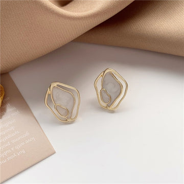 geometric shell earrings